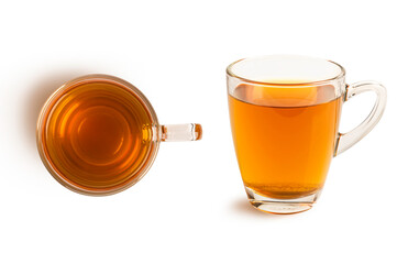 Glass of hot black tea isolated on white background.