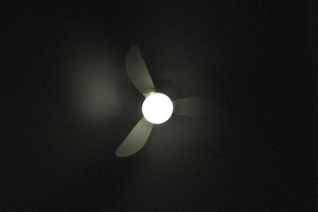 light bulb fan on top of dark room