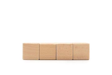Four blank wooden blocks isolated on white background. Empty wooden cubes for text. Copy space and clipping path.