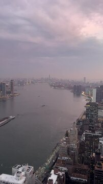 Sunset aerial view to Manhattan Midtown and Downtown at sunset time in New York City