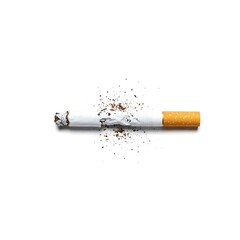 Obraz premium A burnt cigarette lying horizontally on a white surface with tobacco crumbs scattered around it, showing the remnants of smoking and its associated debris.
