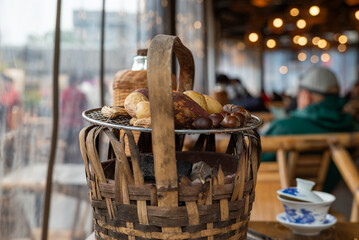 Enjoy a charming Rustic Basket filled with an array of assorted fruits and vegetables