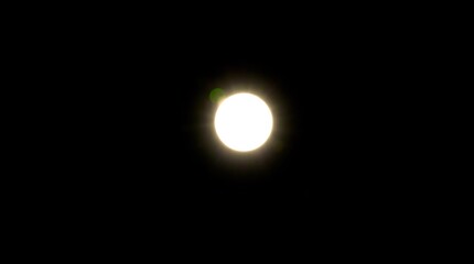 Solitary Glowing Orb in the Darkness.