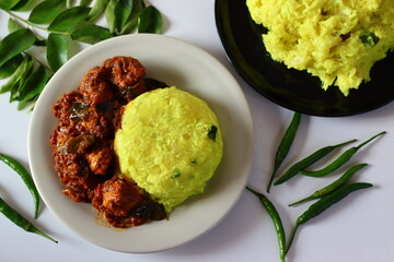 Boiled and mashed tapioca served with rich and spicy chicken curry, infused with aromatic spice