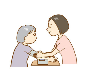 血圧測定をする看護師