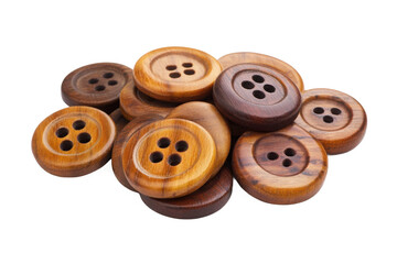 Obraz premium A pile of wooden buttons with four holes in varying shades of brown on a transparent background close up view