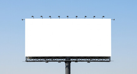 Obraz premium blank white billboard against a clear, light blue sky
