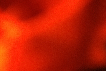Abstract warm orange and black gradient background with noise grain overlay texture. Suitable for...