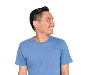 Obraz premium Happy young Asian man looking to the side with a smile, wearing casual blue t-shirt, isolated on transparent background