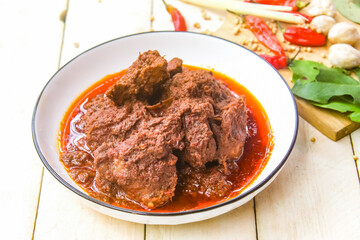 A traditional Indonesian home-made food called rendang, which is made from beef and spices.