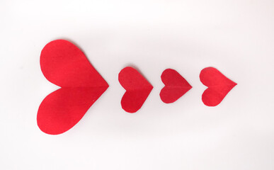 Red paper hearts isolated on white background, paper art copy space for text