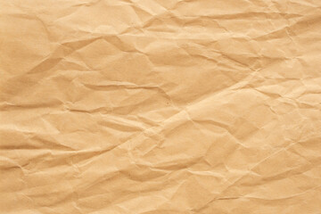 Abstract crumpled and creased recycle brown paper texture background