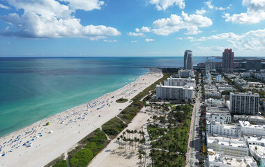 Fototapeta premium Miami Beach skyline. Miami from above. Miamis famous landmarks. South Pointe beach with skyscrapers. Miami city panorama. Miami skyline and ocean. South Florida. Vibrant South Beach.