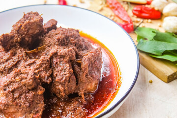 close up of a traditional Indonesian home-made food called rendang, which is made from beef and spices.
