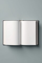 A blank book with its cover opened and laying flat on a grey background, clean lines, exposed pages