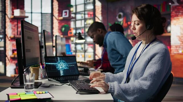 Call center agent uses artificial intelligence to enhance customer interactions and resolve inquiries efficiently. Woman in customer service office using AI communication technologies, camera B