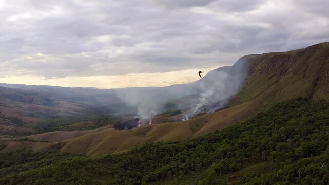 Fire burning across the hills of Serra da Canastra, Minas Gerais, Brazil