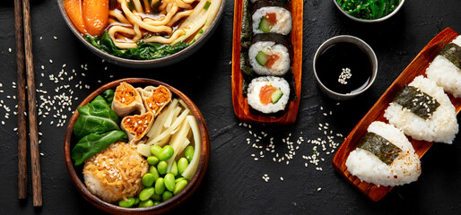Traditional Japanese food dishes served on the table.