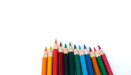 group of colored pencils lined up in a row