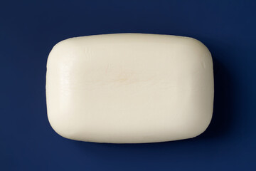 A simple body soap on a dark background. Fragrant soap.