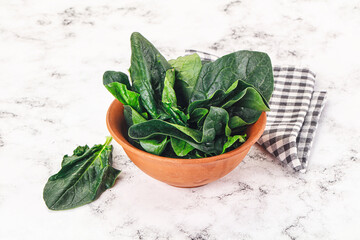 Ripe green spinach leaves heap