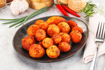 Baked young potato with paprika