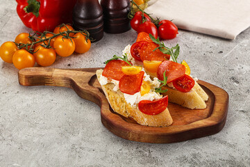 Bruschetta tapas with chorizo and tomato
