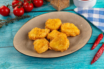Golden crispy fried chicken nuggets