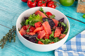 Salad with salmon and arugula