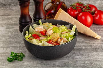 Tasty caesar salad with prawn
