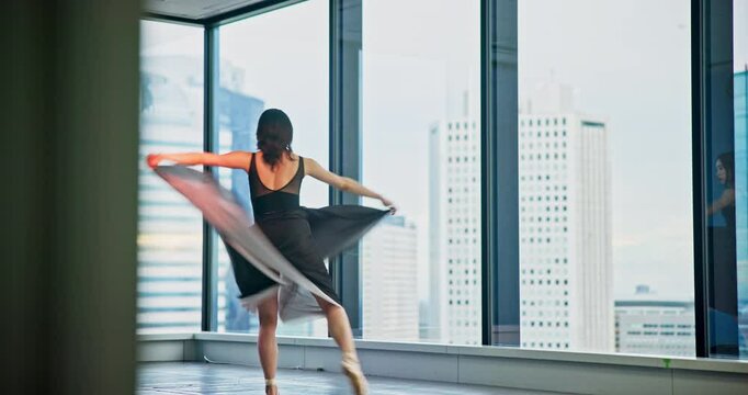 Girl, ballet and dancing at window with talent, elegance or audition performance. Japanese dancer, movement and creative in studio with artistic expression, routine rehearsal or culture choreography