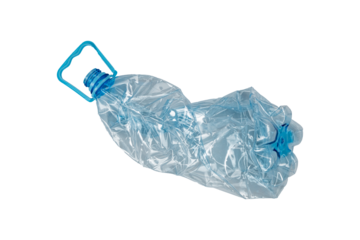 Crushed transparent plastic bottle with a blue handle and cap is isolated. Used PET container prepared for recycling.