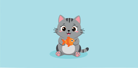 cheerful gray tabby kitten playfully holds an goldfish
