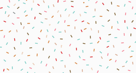 scattered pastel confetti on white background