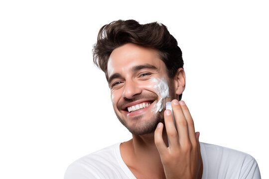 A man with dark hair and white shirt is applying shaving cream and smiling on a  on transparent background png