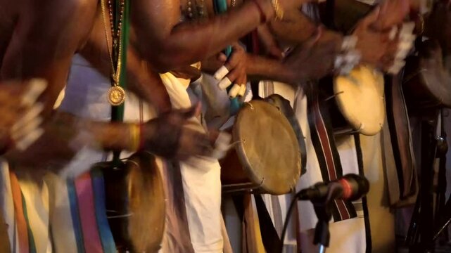 Artists playing Thimila, a percussion musical drum used in the musical orchestra 'Panchavadyam' in South India