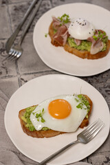 Toast with avocado and fried egg