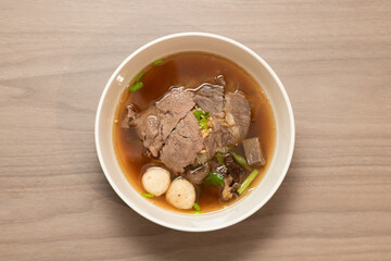 Delicious beef soup local eatery food dish cozy environment close-up view culinary experience