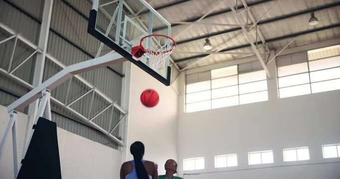Dunk, competition and player with basketball, net and active for sports in college, people and match. Success, students and playing in university for scholarship, energy and games for tournament