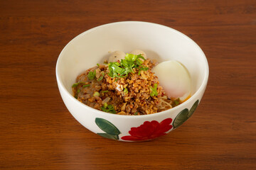 Cozy close-up delicious noodles with toppings in home kitchen