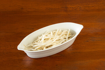 Freshly shredded vegetables kitchen food photography indoor close-up culinary art