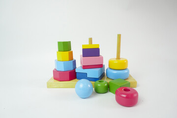 Wooden toy for baby, children isolated, stack of wooden blocks isolated on white background