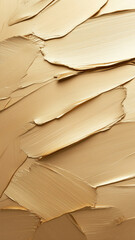 Naklejka premium Rich gold paint texture with bold brush strokes, ideal for elegant and stylish phone wallpaper designs.