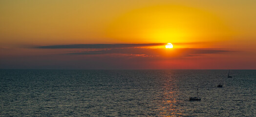 The red sunset over the sea in Anapa