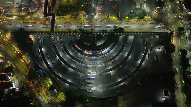 The Semicircular Concentric pattern of the infamous Majestic Bus Stand in Bangalore, India. Night Aerial view of the perfectly planned city, Bengaluru.