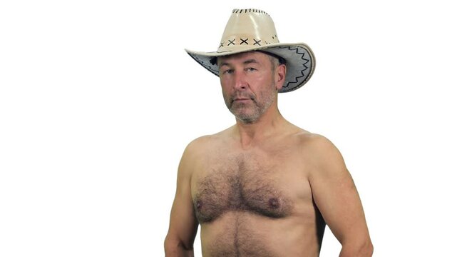 Handsome shirtless middle aged man in cowboy hat posing with crossed arms on chest, Full HD footage with alpha transparency channel isolated on white background
