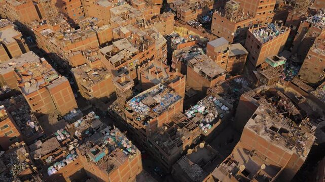 Trash-cluttered Homes At Manshiyat Naser Slum Settlement In Cairo, Egypt. - aerial shot