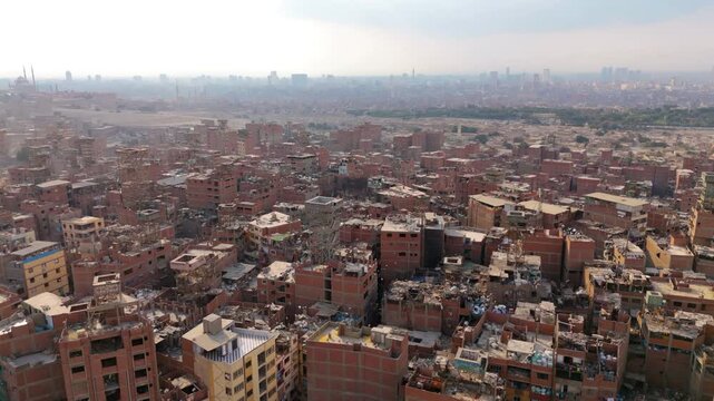 Decrepit Structures With Trash At The Manshiyat Naser City - The Garbage City In Cairo, Egypt. - aerial shot