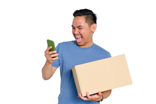 Happy young Asian man celebrating with a phone and package, expressing excitement, isolated on transparent background