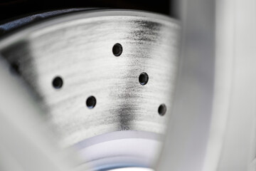 Detailed view of a shiny car brake disc